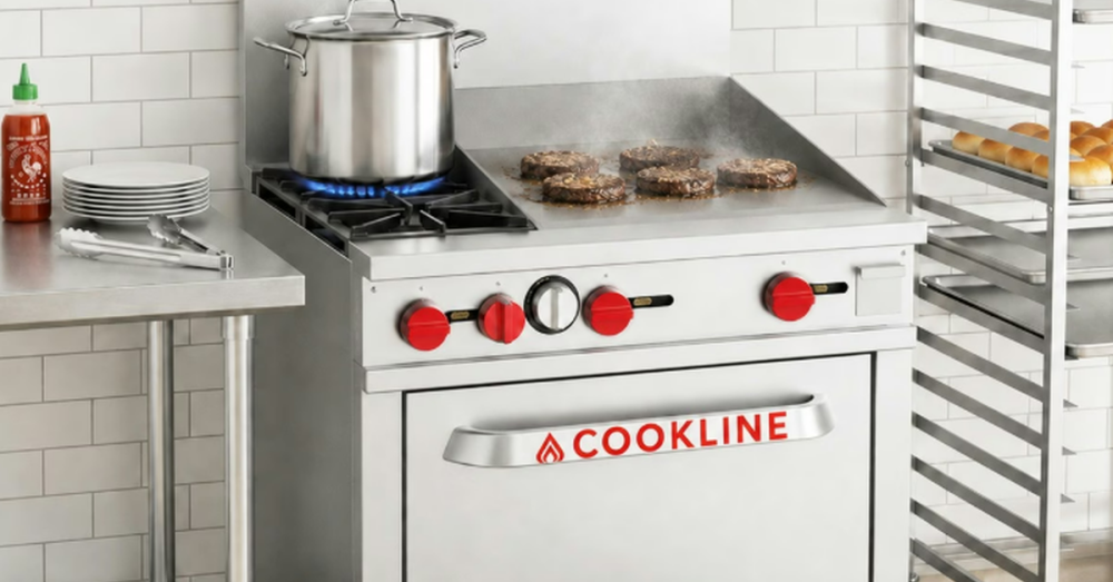 A commercial gas-powered oven inside a restaurant kitchen. Burgers and a pot of food cook on the stove.