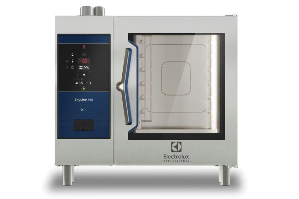 An empty and small metal combi oven with nothing inside. A label on the oven says Electrolux Professional