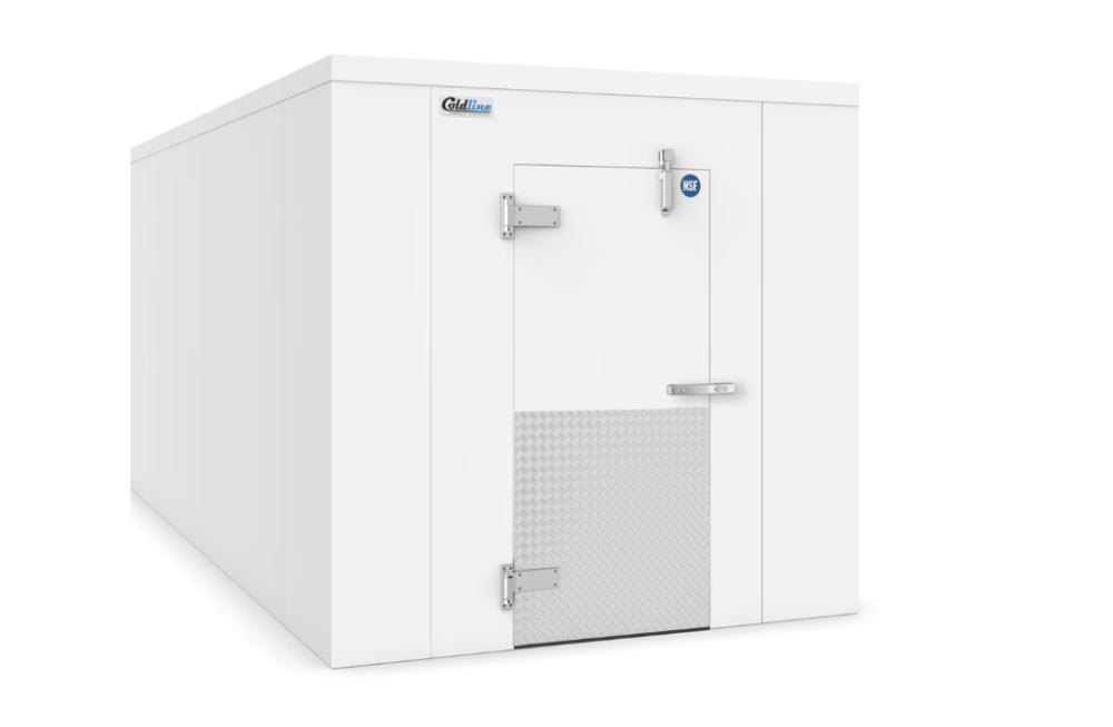 A small, light gray, metal walk-in commercial refrigerator with a closed door displaying an NSF label.